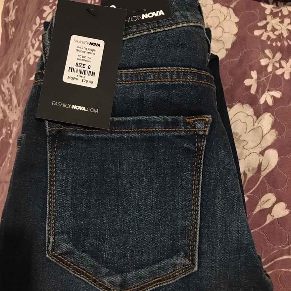 Navy blue ripped skinny jeans from fashion nova